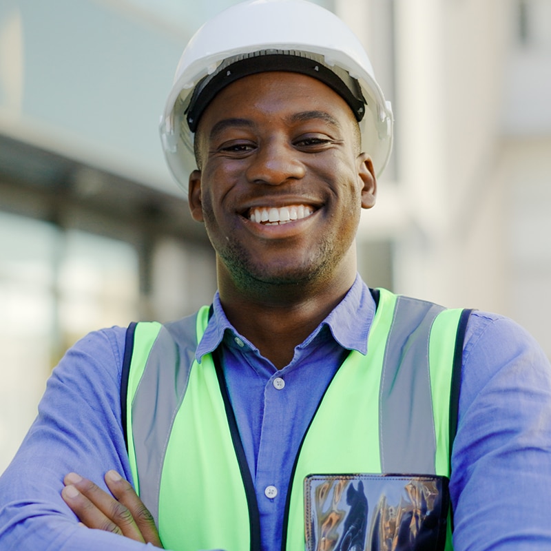 Architect working at table on tablet