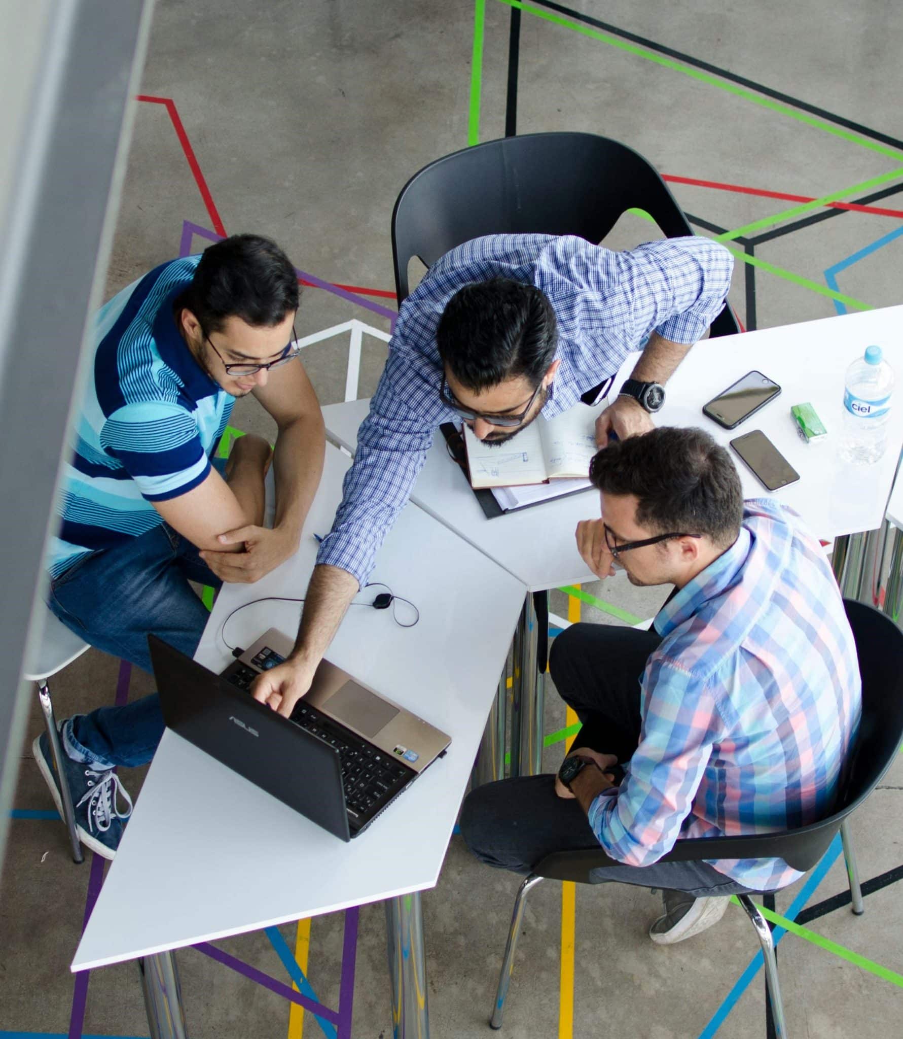 Architect working at table on tablet